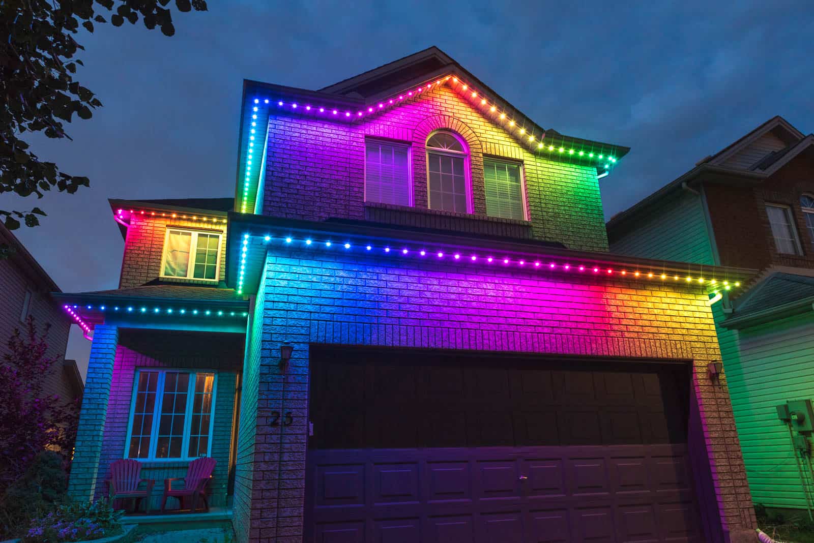 A house lit up in a rainbow of colours with Celebright LED lights